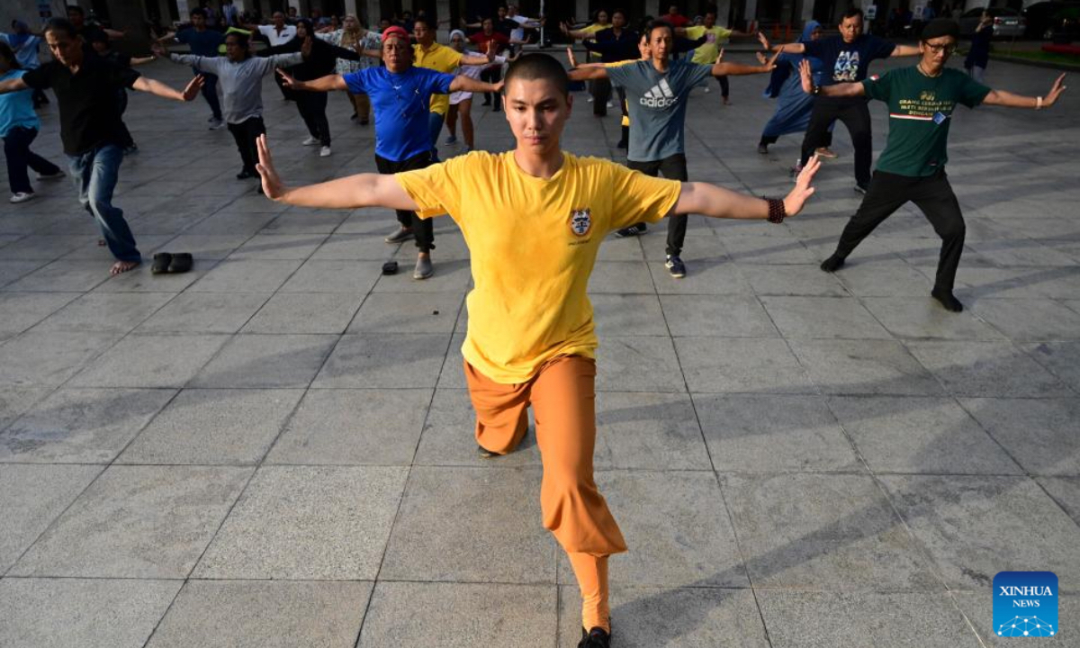 People practice Baduanjin, a traditional Chinese aerobic exercise, in Jakarta, Indonesia, April 24, 2025. (Xinhua)