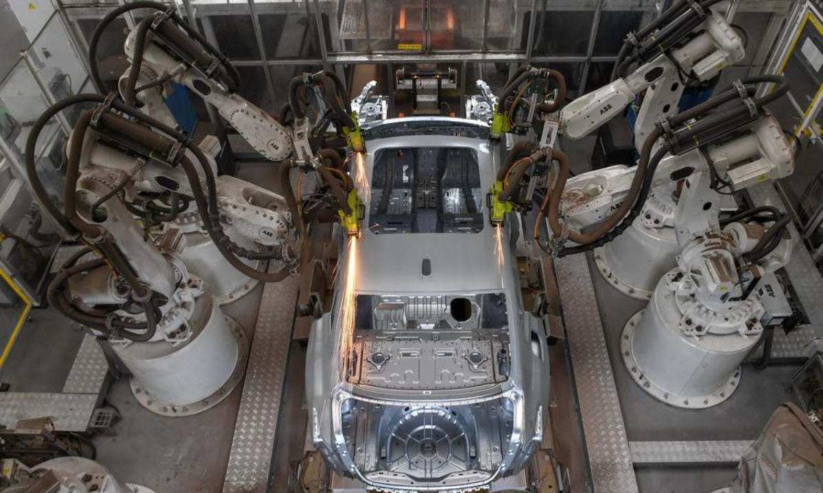Welding robots work at a welding workshop of sedan manufacturer FAW-Hongqi in Changchun, northeast China's Jilin Province, July 6, 2023. (Xinhua/Zhang Nan)