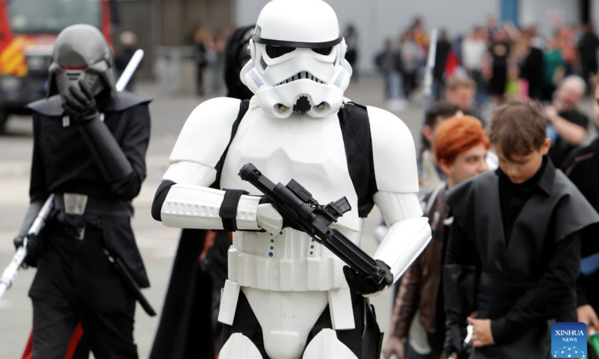A costumed comic enthusiast poses during the East European Comic Con festival in Bucharest, Romania, April 27, 2025. Celebrating pop culture, the three-day East European Comic Con festival brought together thousands of fans who love comic books, movies, TV series and gaming. (Photo by Cristian Cristel/Xinhua)