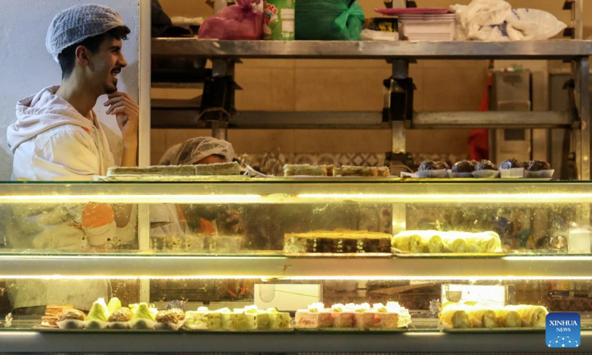 This photo taken on March 30, 2025 shows a sweet shop in Rabat, Morocco. People in Morocco buy sweets in preparation for the Eid al-Fitr holiday. (Xinhua/Huo Jing)