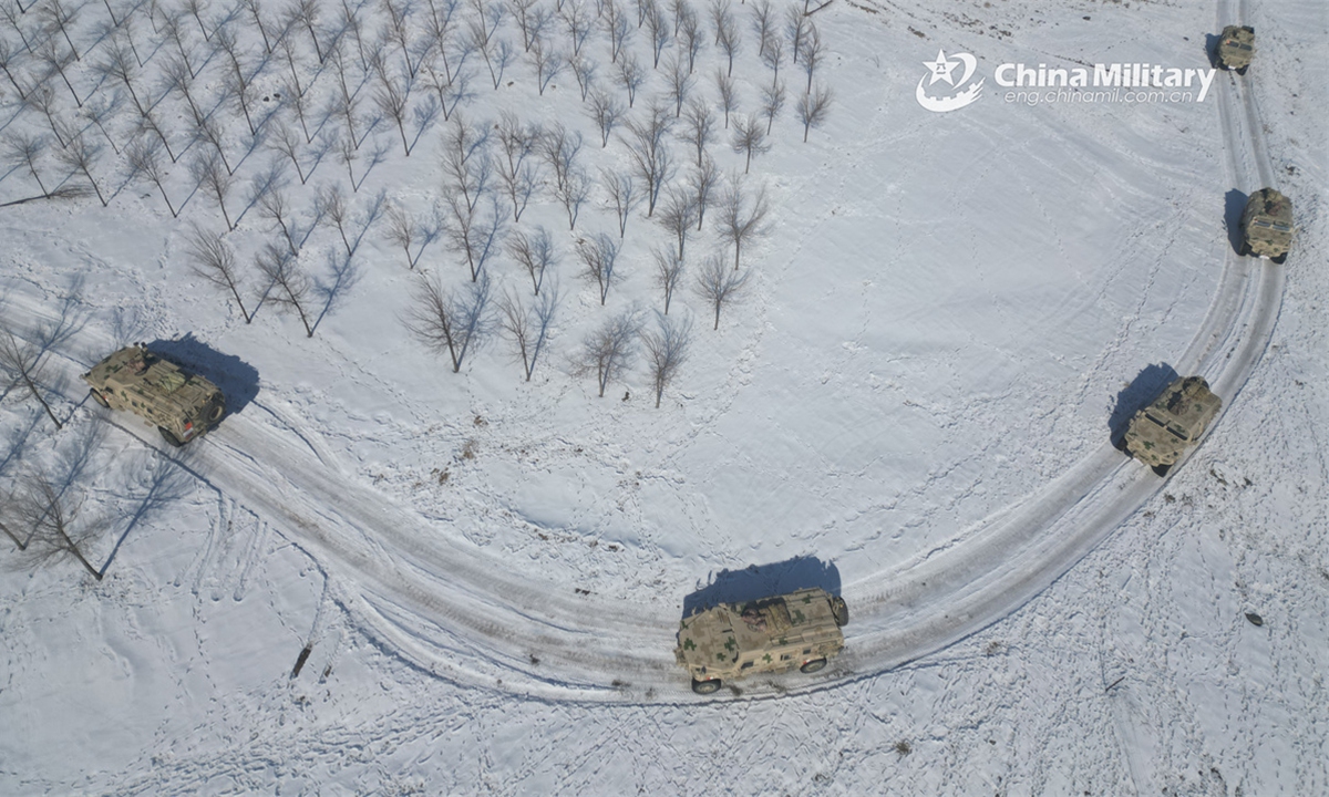Infantry fighting vehicles attached to a reconnaissance detachment of a regiment under the Chinese PLA Xinjiang Military Command maneuver in the snowfield during a multi-subject training exercise on February 24, 2025. (Photo: eng.chinamil.com.cn)