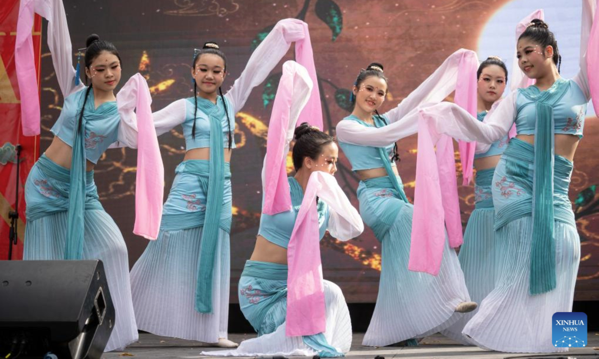 Performers present a traditional Chinese dance during the China in Lujan festival in Lujan, Argentina, on May 4, 2025. The festival, featuring typical Chinese music, traditional dance, tasty food and martial arts, was held here on Sunday. (Photo by Martin Zabala/Xinhua)