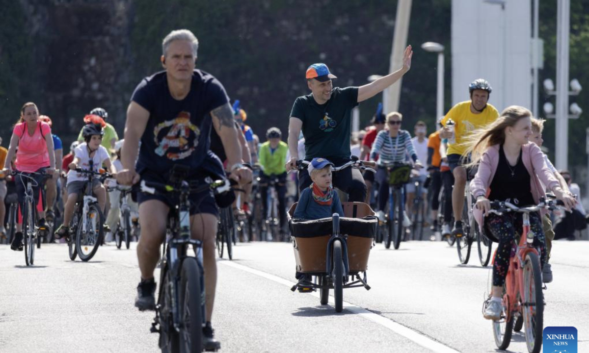 People participate in the I Bike Budapest procession in Budapest, Hungary, on April 26, 2025.
This bike procession is aimed to demonstrate the importance of bicycles as daily city transportation. (Photo by Attila Volgyi/Xinhua)