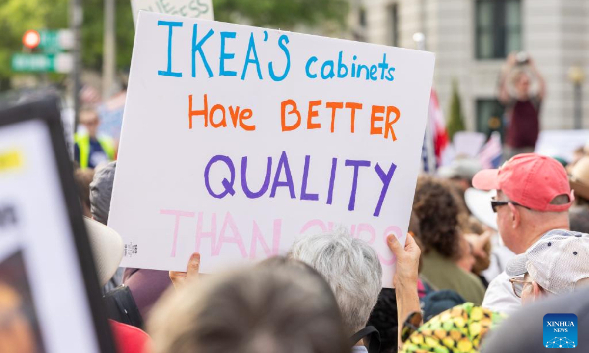 Demonstrators participate in a rally at Freedom Plaza in Washington, D.C., the United States, on May 1, 2025. (Xinhua/Hu Yousong)