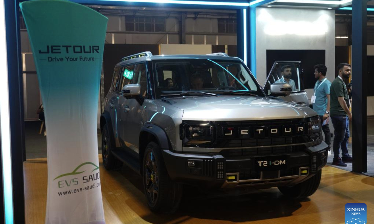 People view a car from Jetour during the EVS Saudi Arabia 2025 exhibition in Riyadh, Saudi Arabia, May 4, 2025. The three-day event kicked off here on Sunday, attracting several Chinese brands. (Xinhua/Luo Chen)