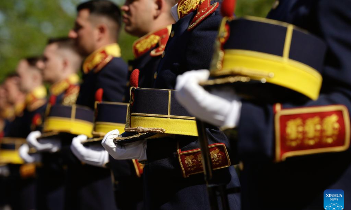 Soldiers attend a ceremony marking War Veterans Day in front of the Military Academy in Bucharest, Romania, April 29, 2025. Photo: Xinhua
