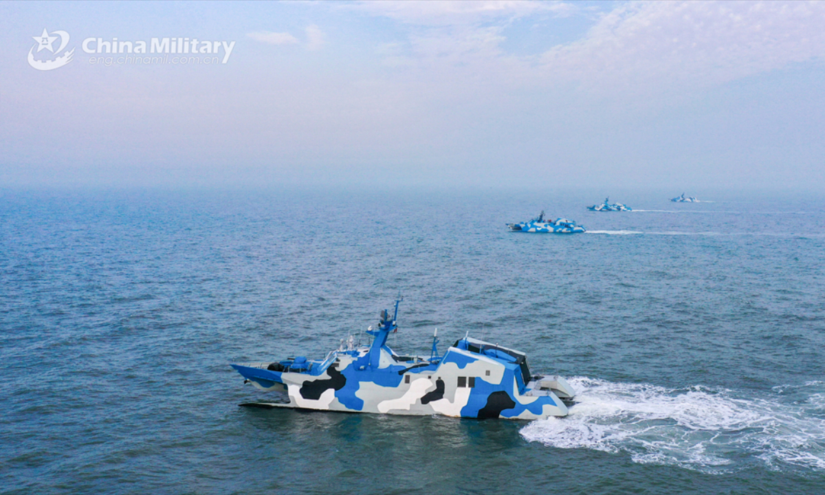 A group of fast attack missile boats attached to the Chinese PLA Navy sail at sea during a maritime training exercise on April 5, 2025. (eng.chinamil.com.cn/Photo by Wang Heqiu)