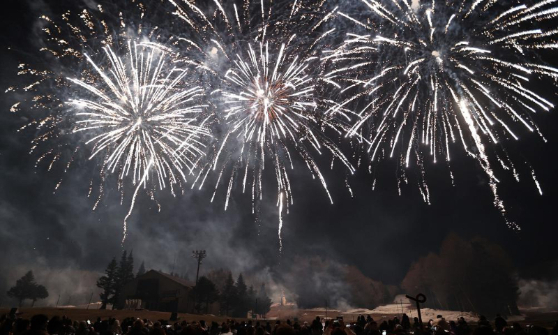 People watch fireworks during a fireworks show held at the foot of Mount Fuji in Yamanashi, Japan, April 19, 2025. (Xinhua/Jia Haocheng)