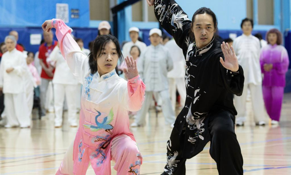 Tai Chi enthusiasts perform during the 2025 Toronto World Tai Chi Day event in Markham, the Greater Toronto Area, Canada, on April 26, 2025. The World Tai Chi Day falls on the last Saturday of April. (Photo by Zou Zheng/Xinhua)