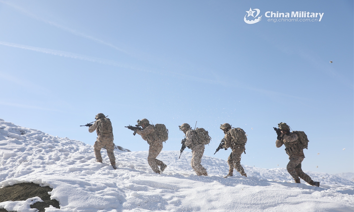 Soldiers assigned to a reconnaissance detachment of a regiment under the Chinese PLA Xinjiang Military Command march in combat formation during a multi-subject training exercise on February 24, 2025.  (Photo: eng.chinamil.com.cn)