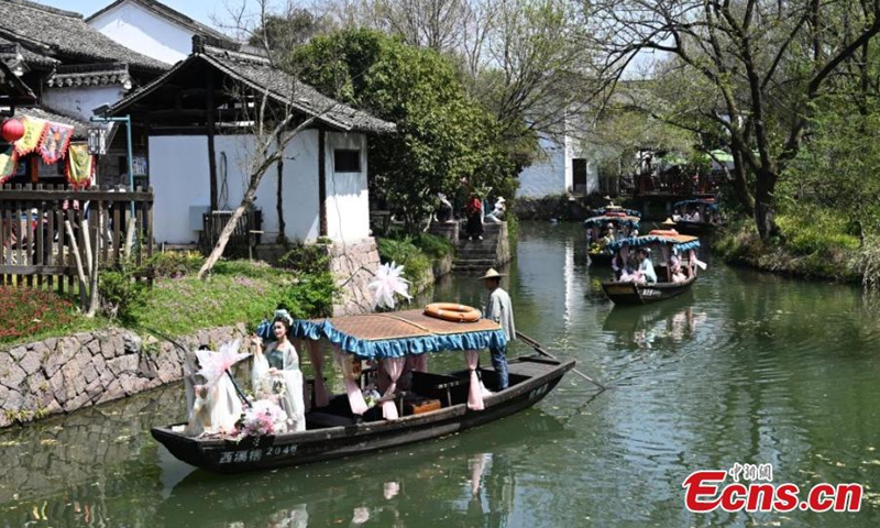 A boat parade is held during a celebration for the Huazhao Festival in Xixi Wetland, Hangzhou, east China's Zhejiang Province, March 24, 2025.  (Photo: China News Service)