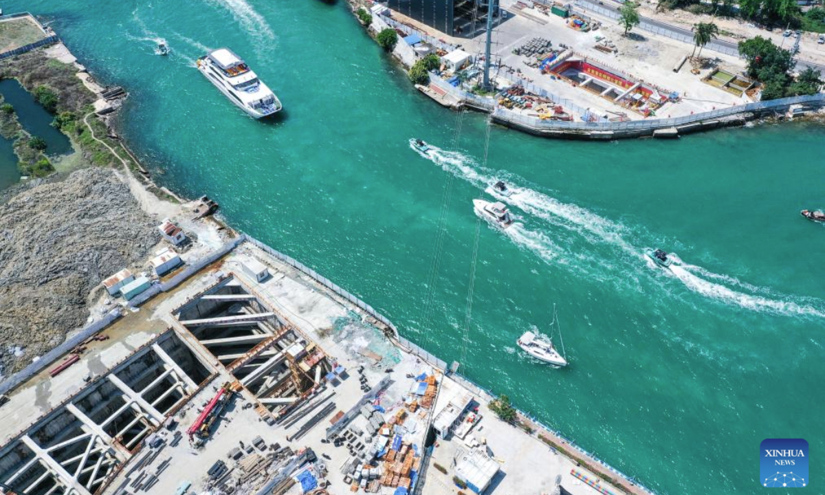An aerial drone photo taken on May 5, 2025 shows the construction site of the Sanya River estuary passage project in Sanya, south China's Hainan Province. As the first underwater tunnel in Sanya, the project undertaken by China Railway 20th Bureau Group is making steady progress. It will further optimize the spatial layout of Sanya City once completed. (Xinhua/Zhao Yingquan)