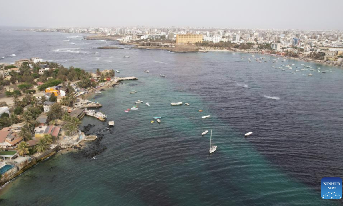 An aerial drone photo taken on May 4, 2025 shows Ngor Island in Dakar, the capital of Senegal. The Ngor Island is a popular destination for water sports, recreational fishing, and birdwatching. (Xinhua/Si Yuan)