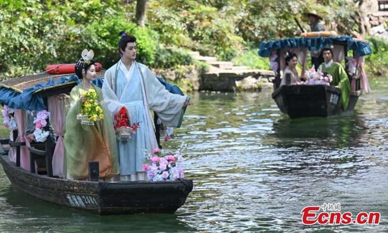 A boat parade is held during a celebration for the Huazhao Festival in Xixi Wetland, Hangzhou, east China's Zhejiang Province, March 24, 2025.  (Photo: China News Service)