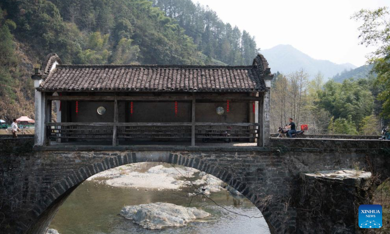 This photo taken on March 26, 2025 shows the Sankeshu roofed bridge in Xiuning County of Huangshan City, east China's Anhui Province. Roofed bridge, also called covered bridge, is a unique architectural structure in Huangshan City. These ingeniously structured and elegantly shaped bridges carry rich cultural significance and form a distinctive part of Huizhou culture.

In recent years, the city of Huangshan has promoted the inheritance and development of roofed bridge culture through conservation projects, revitalization efforts, and promotional campaigns, attracting an increasing number of visitors to experience the allure of these ancient architectural marvels. (Xinhua/Zhang Duan)