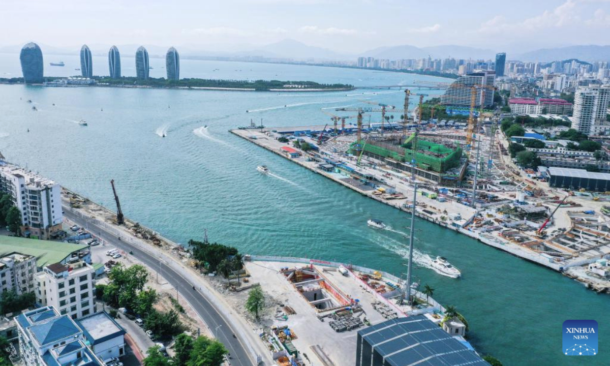 An aerial drone photo taken on May 5, 2025 shows the construction site of the Sanya River estuary passage project in Sanya, south China's Hainan Province. As the first underwater tunnel in Sanya, the project undertaken by China Railway 20th Bureau Group is making steady progress. It will further optimize the spatial layout of Sanya City once completed. (Xinhua/Zhao Yingquan)