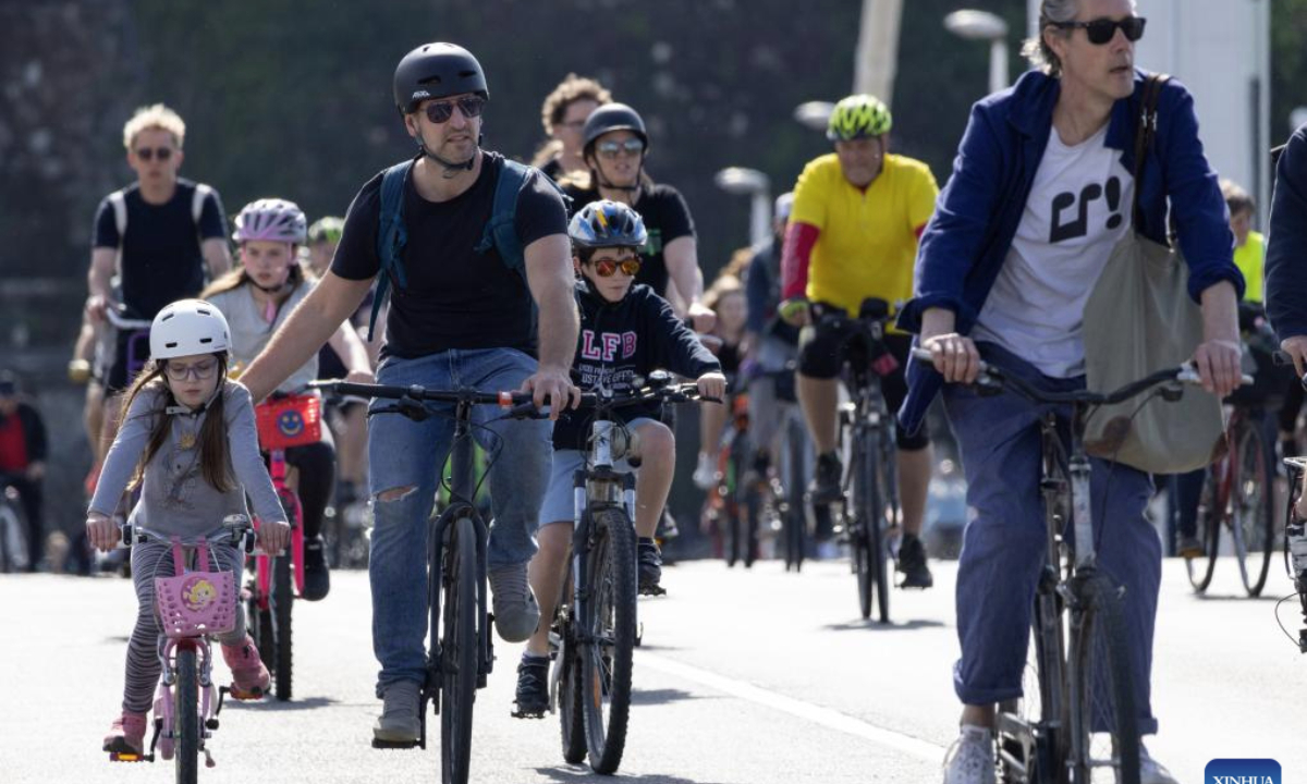 People participate in the I Bike Budapest procession in Budapest, Hungary, on April 26, 2025.
This bike procession is aimed to demonstrate the importance of bicycles as daily city transportation. (Photo by Attila Volgyi/Xinhua)