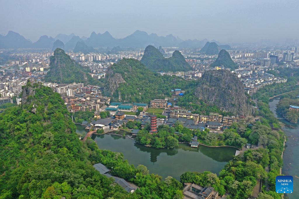 An aerial drone photo taken on April 10, 2022 shows a view in Guilin, south China's Guangxi Zhuang Autonomous Region. Guilin, renowned for its breathtaking karst landscape, is one of China's most iconic destinations. Nestled in the Guangxi Zhuang Autonomous Region, Guilin is celebrated for its stunning natural beauty, with limestone peaks and serene rivers that attract visitors from around the world. Its unique topography and vibrant culture make it a cornerstone of Chinese tourism. (Photo: Xinhua)