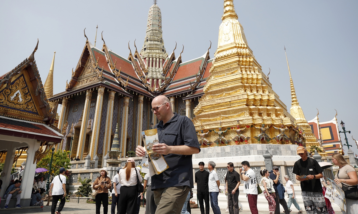 Foreign tourists visit the Temple of the Emerald Buddha at the Grand Palace complex in Bangkok, Thailand, on February 05, 2025.?Photo: VCG