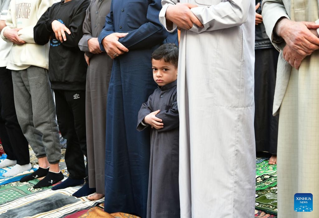 People perform the special prayer of the Muslim Eid al-Fitr feast in Damascus, Syria, March 31, 2025. (Photo: Xinhua)
