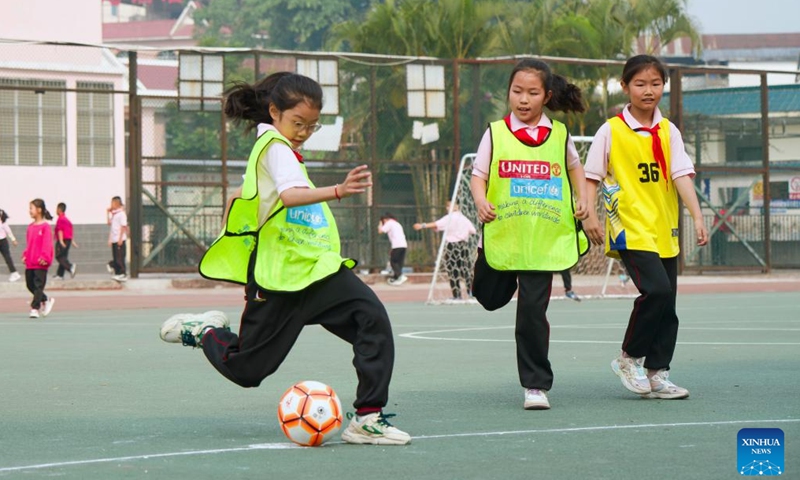 Pupils play football on the playground at a primary school in Ruili, southwest China's Yunnan Province, March 31, 2025. (Photo: Xinhua)