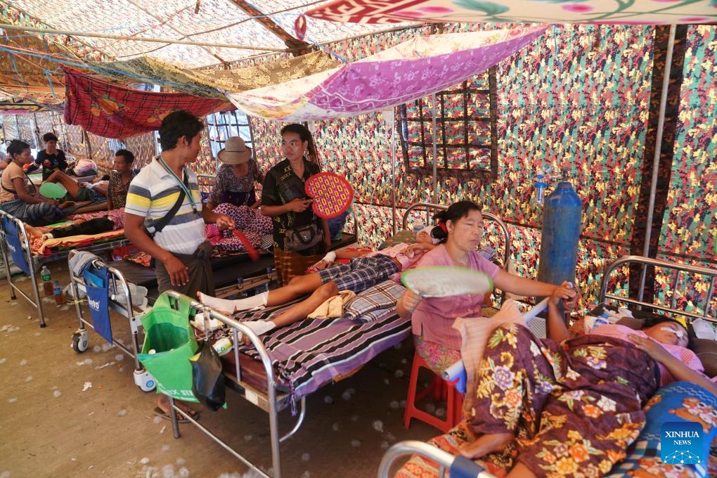 People injured in an earthquake receive medical treatment in a tent at a hospital in Nay Pyi Taw, Myanmar, March 31, 2025. (Photo: Xinhua)