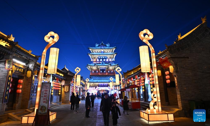 Tourists visit Taiyuan Ancient County scenic spot in Taiyuan, north China's Shanxi Province, Feb. 5, 2025. Taiyuan, with a history of over 2,500 years, is a renowned historical and cultural city in northern China. In recent years, the city has coordinated efforts to upgrade industrial structure, protect the environment and improve urban management, achieving coordinated progress in environmental restoration, economic development and people's livelihoods. (Photo: Xinhua)