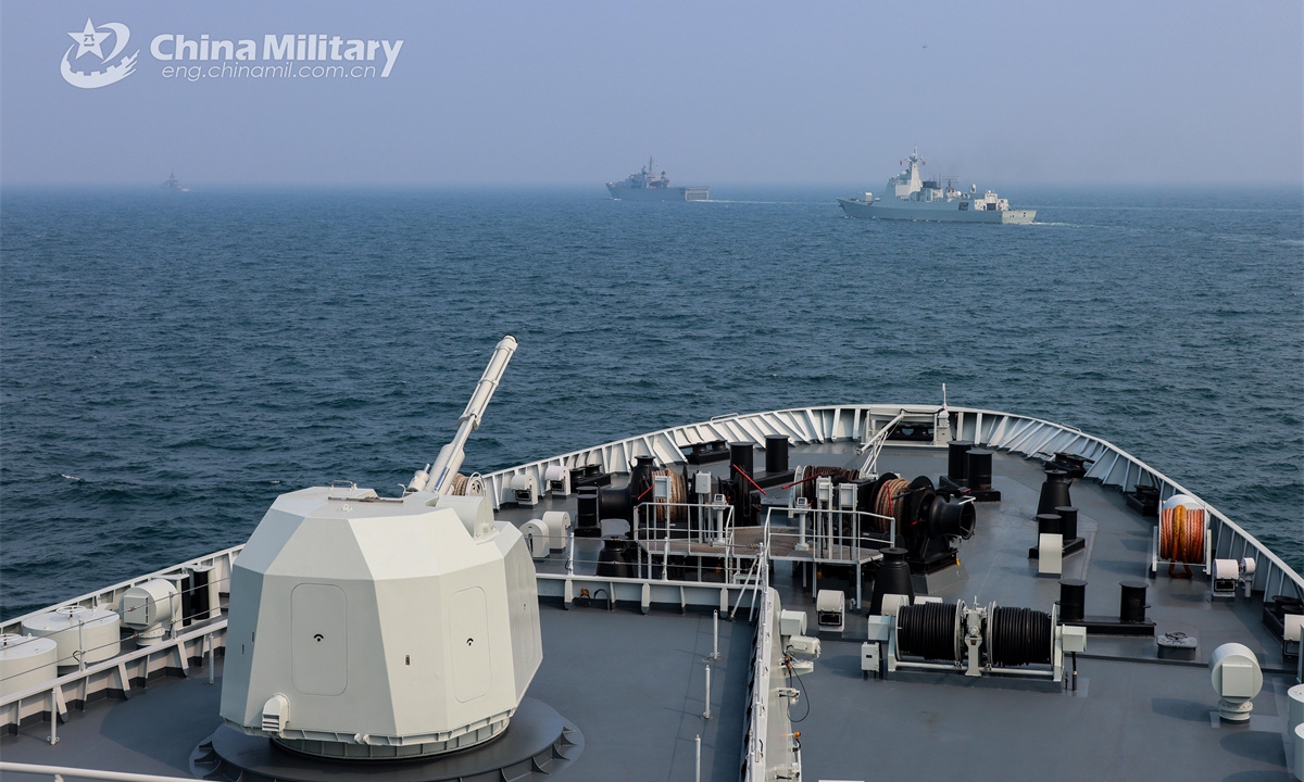 Chinese and Thai participating naval vessels steam in formation in waters of the South China Sea on March 28, 2025. China-Thailand Blue Strike 2025 joint naval training was held in south China's Guangdong Province from March 26 to April 2, 2025. During the joint training, both sides' participating troops conducted joint underwater mine countermeasure operation, anti-ship strike, maritime search and rescue, and field survival operation, as well as other training subjects both in the sea and land domains. (eng.chinamil.com.cn/Photo)