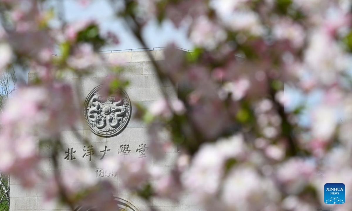 Crabapple blossoms are pictured at the Weijin Road campus of Tianjin University in north China's Tianjin, April 5, 2025. Tianjin University held a campus open day event upon the season of crabapple blossoms, attracting numerous citizens and tourists to enjoy the view and appreciate the beauty of the campus. The Weijin Road campus of Tianjin University currently hosts over 800 flowering crabapple trees, most of which are around 40 years old. The best viewing period for the crabapple blossoms this year is expected to be in early April, lasting for about ten days. (Photo: Xinhua)