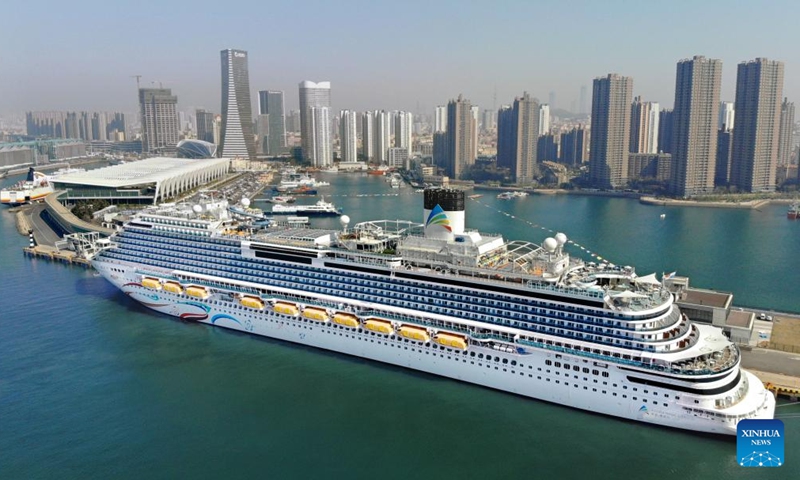 An aerial drone photo taken on April 6, 2025 shows Adora Magic City berthing at the Qingdao International Cruise Terminal in Qingdao, east China's Shandong Province. As China's first domestically built large cruise ship, Adora Magic City embarked on its commercial maiden voyage on Jan. 1, 2024. This time, the cruise ship made its debut in Qingdao, which is its first appearance in a Chinese port city other than its home port in Shanghai, and will depart for Jeju of South Korea and Fukuoka of Japan. Photo: Xinhua