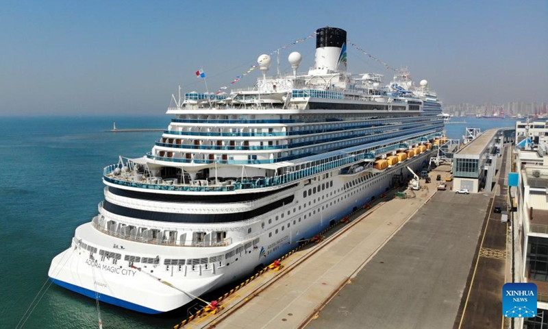 An aerial drone photo taken on April 6, 2025 shows Adora Magic City berthing at the Qingdao International Cruise Terminal in Qingdao, east China's Shandong Province. As China's first domestically built large cruise ship, Adora Magic City embarked on its commercial maiden voyage on Jan. 1, 2024. This time, the cruise ship made its debut in Qingdao, which is its first appearance in a Chinese port city other than its home port in Shanghai, and will depart for Jeju of South Korea and Fukuoka of Japan. Photo: Xinhua