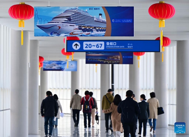 Passengers prepare to board the Adora Magic City at the Qingdao International Cruise Terminal in Qingdao, east China's Shandong Province, April 6, 2025. As China's first domestically built large cruise ship, Adora Magic City embarked on its commercial maiden voyage on Jan. 1, 2024. This time, the cruise ship made its debut in Qingdao, which is its first appearance in a Chinese port city other than its home port in Shanghai, and will depart for Jeju of South Korea and Fukuoka of Japan. Photo: Xinhua