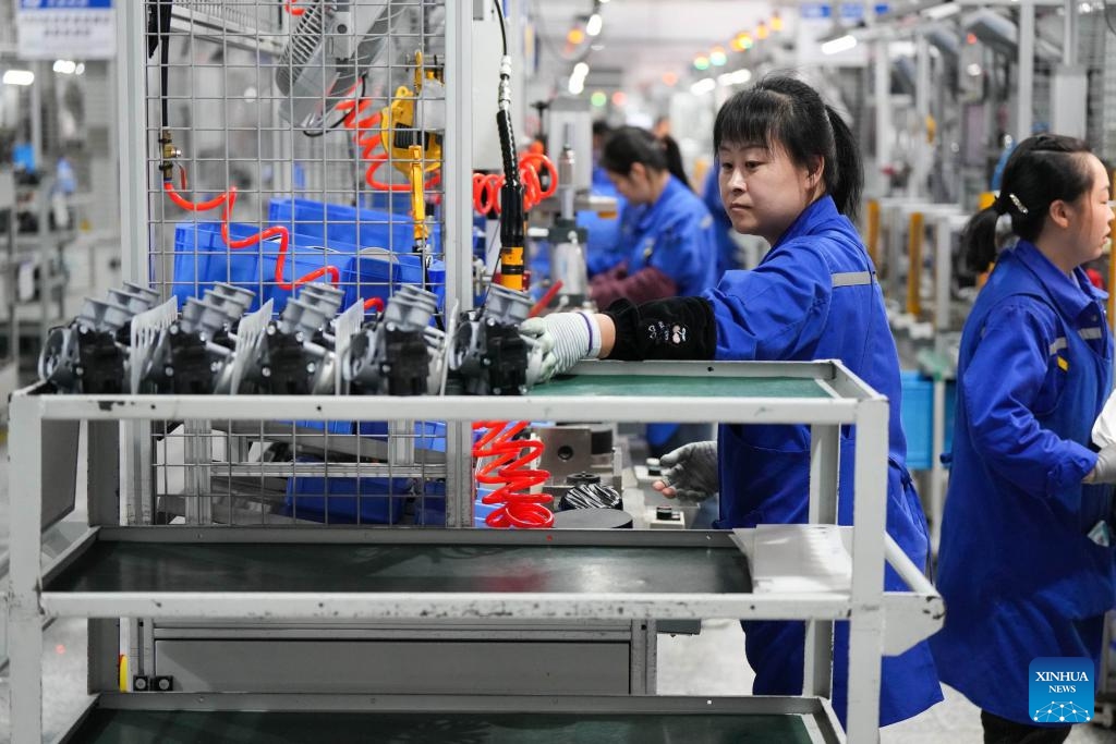 Workers are seen on the assembly and inspection line of automobile components at VIE Science and Technology Co., Ltd. in Diankou Town of Zhuji, east China's Zhejiang Province, April 7, 2025. Zhuji has made continuous efforts in promoting the quality development of its private sector in recent years. Home to many state-level high-tech enterprises, the city's value-added industrial output of enterprises above the designated size has maintained growth for 47 consecutive months.  (Xinhua/Zheng Huansong)