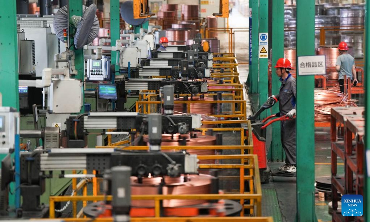 A worker is seen at a copper pipe workshop of Zhejiang Hailiang Limited in Diankou Town of Zhuji, east China's Zhejiang Province, April 7, 2025. Zhuji has made continuous efforts in promoting the quality development of its private sector in recent years. Home to many state-level high-tech enterprises, the city's value-added industrial output of enterprises above the designated size has maintained growth for 47 consecutive months. (Xinhua/Zheng Huansong)