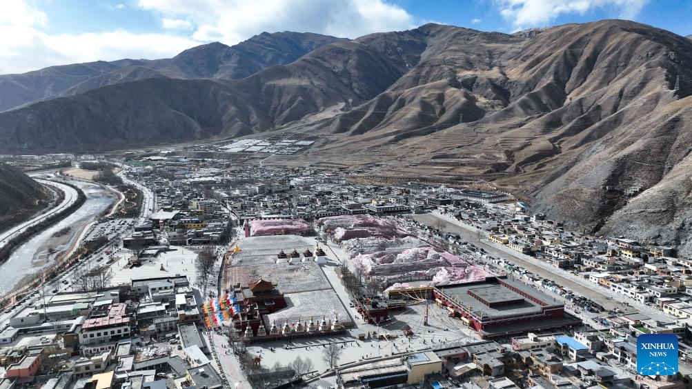 This aerial drone photo taken on April 6, 2025 shows a view of the Jiana mani stone mound in Yushu City, Yushu Tibetan Autonomous Prefecture, northwest China's Qinghai Province. The Jiana mani stone mound is a cultural relic under national protection. The mound is composed of billions of mani stones and used by local people when they hold prayers' wheels and mutter the six-syllable prayer to observe their daily ritual. (Xinhua/Zheng Huansong)