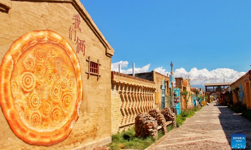 This photo taken on Aug. 18, 2019 shows a view on one of the eight main streets in Tekes County in Ili Kazak Autonomous Prefecture, northwest China's Xinjiang Uygur Autonomous Region. Established in the 1930s, Tekes is located deep in the Ili River Valley on the northern slopes of the Tianshan Mountains. The county is renowned for its Bagua (or Eight Trigrams) layout: from the central Tai Chi Plaza, eight main streets extend outward in a progressive and radial pattern, while the roads are interconnected. (Photo: Xinhua)
