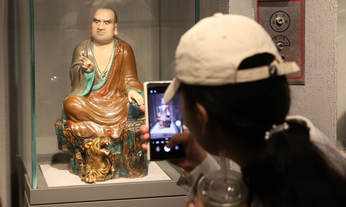 A visitor admires the trending