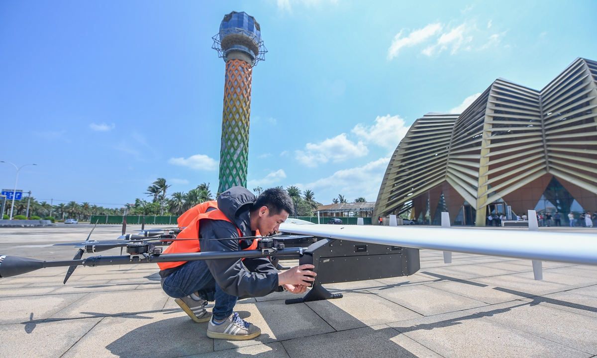 A staff member monitors the take-off status of a drone at the Jiangdong New Area Exhibition Center in Haikou, Hainan Province, South China, on April 11, 2025, as part of the vibrant China International Consumer Products Expo held in the city. Photo: VCG