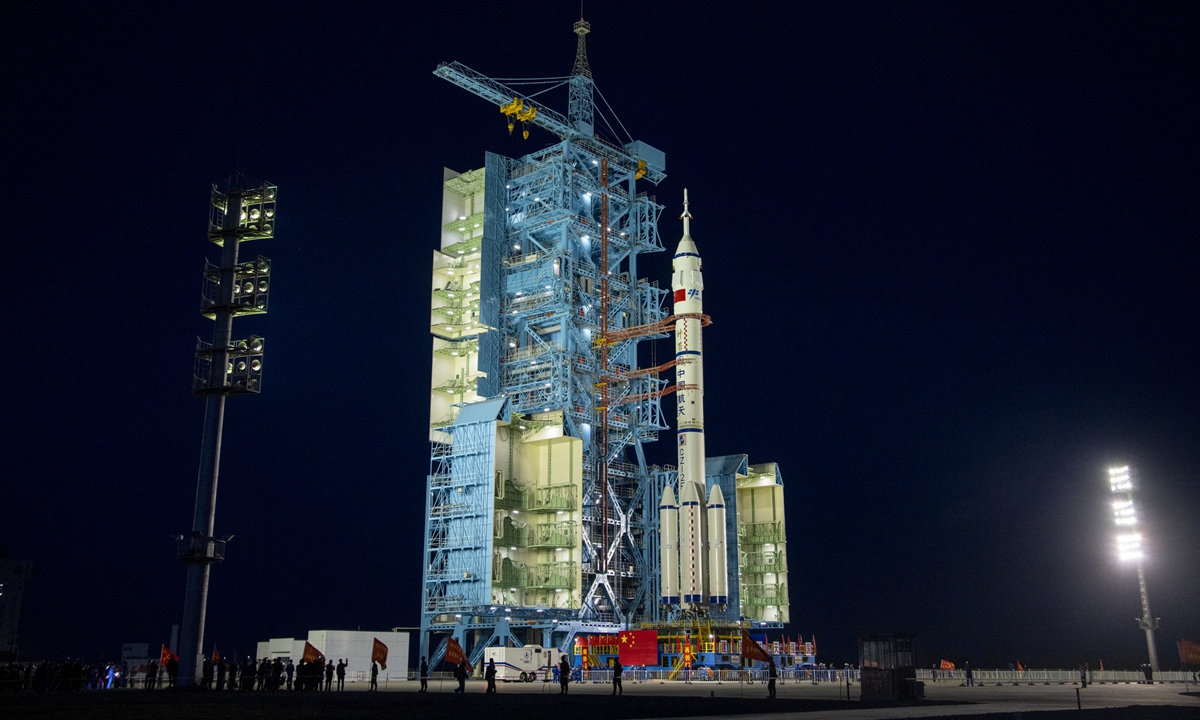The combination of the Shenzhou-20 crewed spaceship and a Long March-2F carrier rocket prepares for take-off after being transferred to the launching area of the Jiuquan Satellite Launch Center on April 16, 2025. Photo: VCG