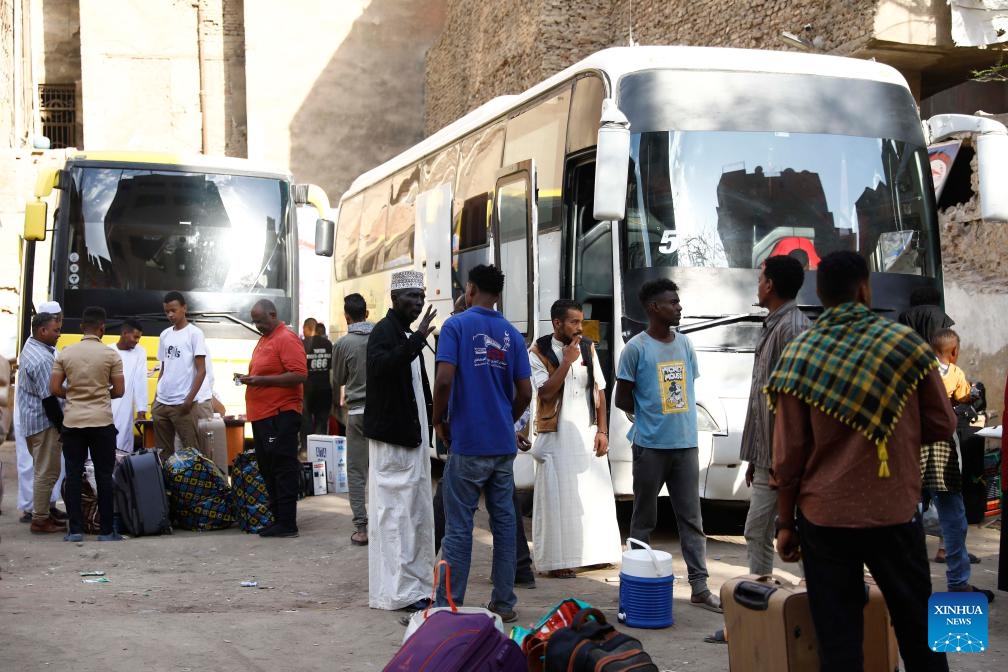 Sudanese refugees wait to take buses to return to Sudan in Cairo, Egypt, on April 13, 2025. (Photo: Xinhua)