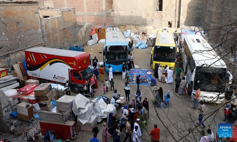 Sudanese refugees wait to take buses to return to Sudan in Cairo, Egypt, on April 13, 2025. (Photo: Xinhua)