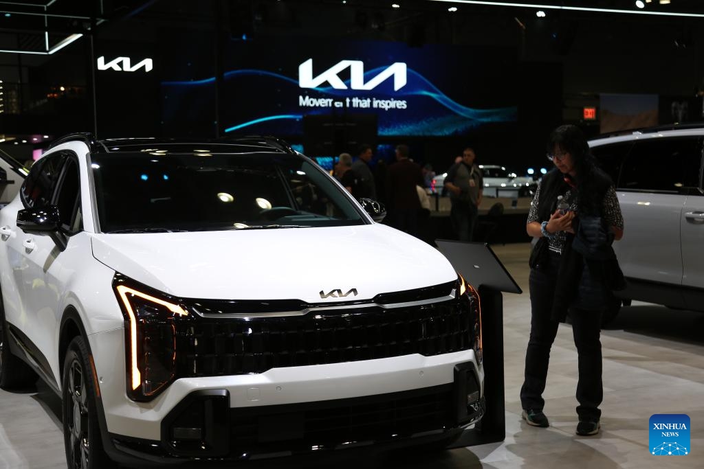 A visitor looks at a car of Kia Corp. during the 2025 New York International Auto Show at Javits Center in New York, the United States, on April 16, 2025. 2025 New York International Auto Show kicked off here on Wednesday with public days running from April 18 to April 27. (Photo: Xinhua)