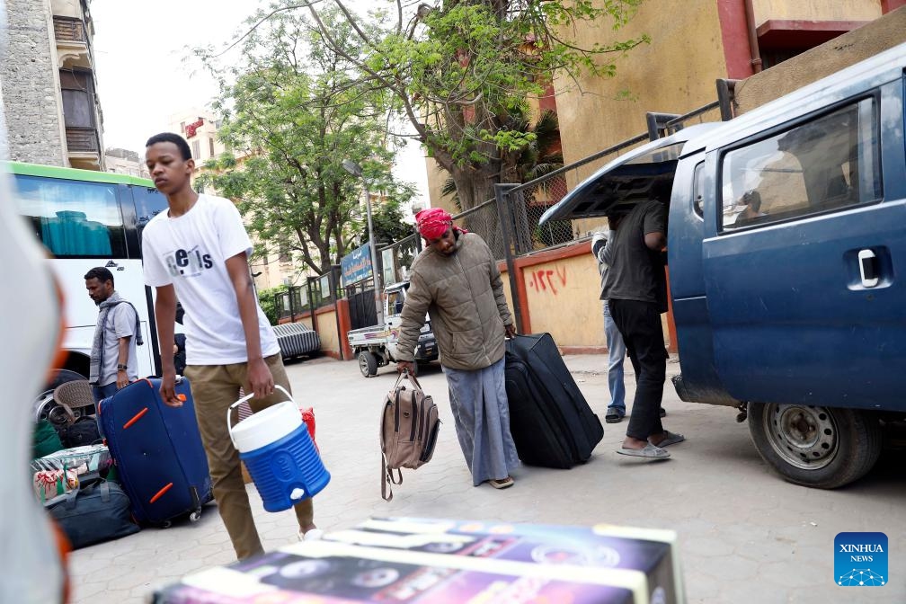 Sudanese refugees wait to take buses to return to Sudan in Cairo, Egypt, on April 13, 2025. (Photo: Xinhua)
