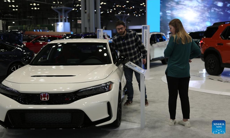 Visitors look at a car of Honda Motor Co. during the 2025 New York International Auto Show at Javits Center in New York, the United States, on April 16, 2025. 2025 New York International Auto Show kicked off here on Wednesday with public days running from April 18 to April 27. (Photo: Xinhua)