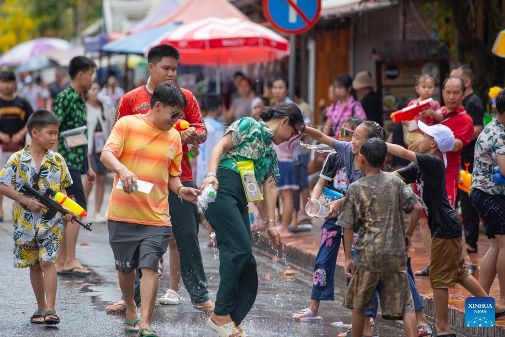 People participate in the celebration of the Songkran Festival in Luang Prabang, Laos, April 15, 2025. Laos celebrates the Songkran Festival, or the Lao New Year from April 14 to 16 this year. A series of celebrations are held to celebrate this traditional festival. (Photo: Xinhua)