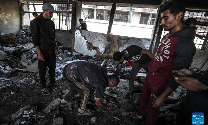People gather at a shelter after an Israeli airstrike in Jabalia refugee camp, northern Gaza Strip, on April 17, 2025. At least 39 Palestinians were killed and dozens more wounded in Israeli strikes across the Gaza Strip on Thursday, according to the Gaza-based civil defense. (Photo: Xinhua)