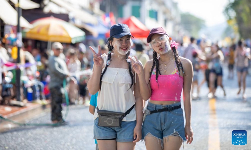 People participate in the celebration of the Songkran Festival in Luang Prabang, Laos, April 15, 2025. Laos celebrates the Songkran Festival, or the Lao New Year from April 14 to 16 this year. A series of celebrations are held to celebrate this traditional festival. (Photo: Xinhua)