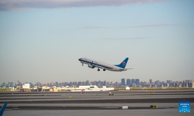 An airplane bound for Guangzhou of Guangdong Province takes off at Urumqi Tianshan International Airport in Urumqi, northwest China's Xinjiang Uygur Autonomous Region, April 17, 2025. A new terminal at Urumqi Tianshan International Airport in northwest China's Xinjiang Uygur Autonomous Region began trial operations on Thursday, marking a major step in expanding regional air capacity. (Photo: Xinhua)