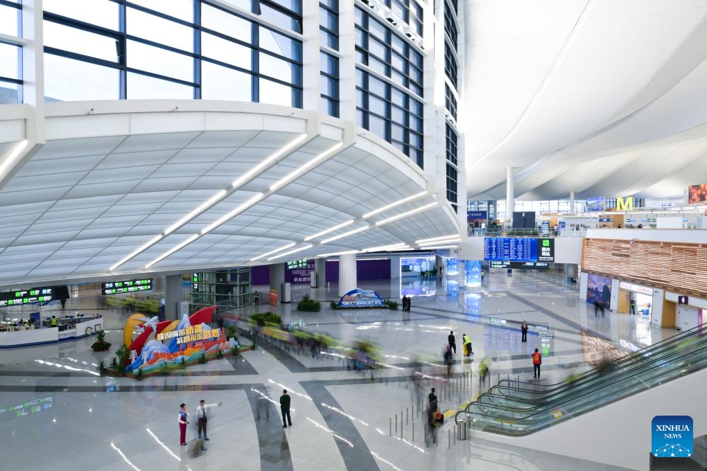 People are seen at a new terminal at Urumqi Tianshan International Airport in Urumqi, northwest China's Xinjiang Uygur Autonomous Region, April 17, 2025. A new terminal at Urumqi Tianshan International Airport in northwest China's Xinjiang Uygur Autonomous Region began trial operations on Thursday, marking a major step in expanding regional air capacity. (Photo: Xinhua)