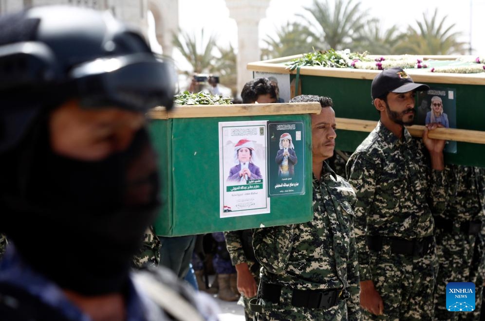 People carry coffins of the victims killed in the U.S. airstrikes during the funeral ceremony in Sanaa, Yemen, on April 17, 2025. A funeral ceremony for victims killed in the U.S. airstrikes was held in Yemen's capital Sanaa on Thursday. (Photo: Xinhua)